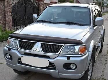 Дефлектор капота (мухобойка) Mitsubishi Pajero Sport 2000-2008 (Митсубиши Паджеро Спорт) SIM